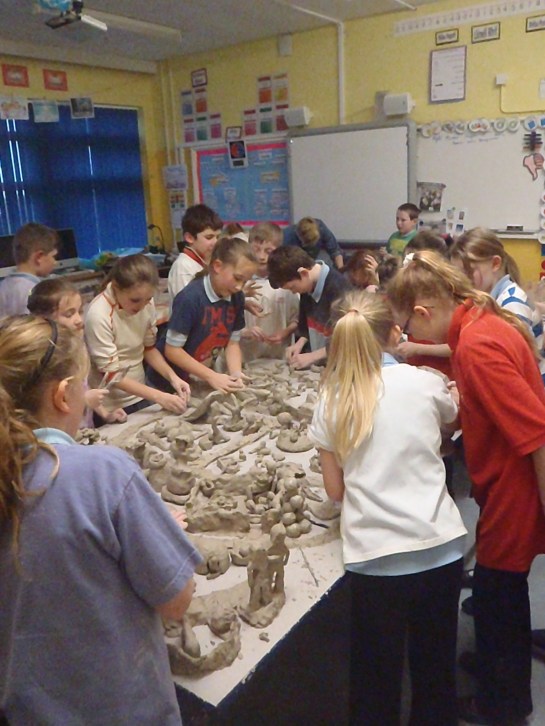 Making a Zoo complete with 4 toilets, a car park and an over-looking military complex. We worked on this all day, took photos and then squashed it all up. Fantastic fun, lots of skill sharing and teamwork. 