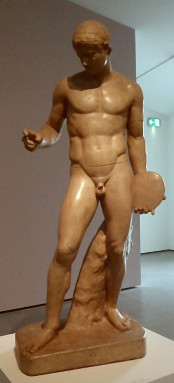 It really looks like this lad is checking his phone.