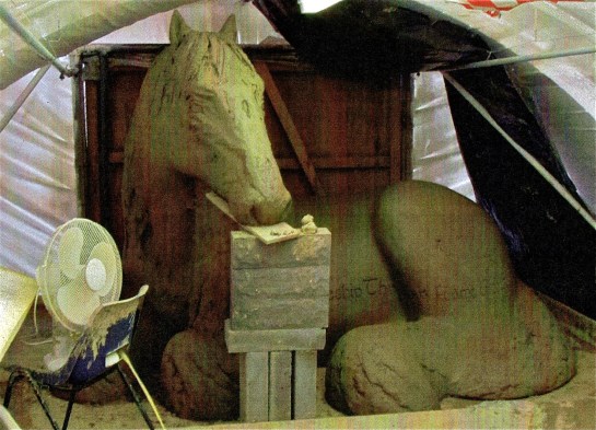 Bruce in progress. There is a clay support wall under his head and the stack of blokes.