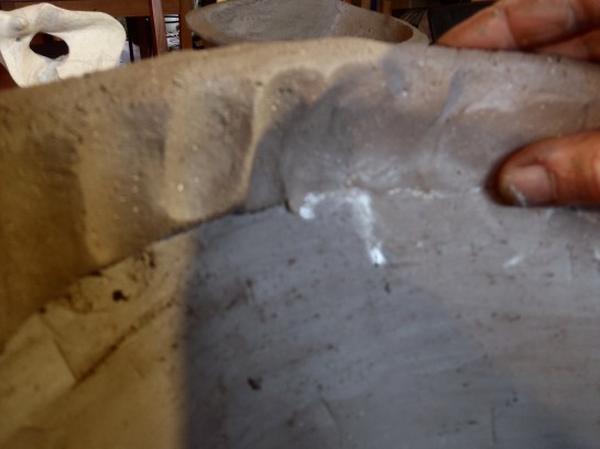 pinch upwards gently only at the seam off the join. (your finger and thumb will touch pot and coil each time) I call this lining-up.