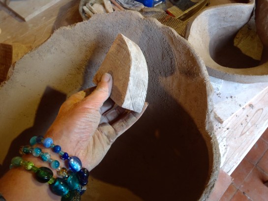 Use curved tools to paddle the inside.